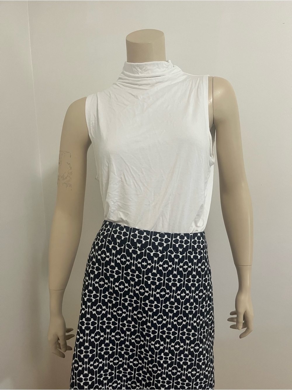 Babaton White Sleeveless Mock Neck Tee